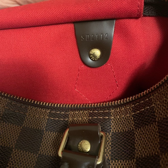 Damier Ebene Speedy 30 Louis Vuitton
Top Handle Bag
Includes Lock - Picture 5 of 6